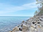 The association owns nearly 2000 feet of frontage on Lake Michigan. To get further north you need to walk over or around this cement.